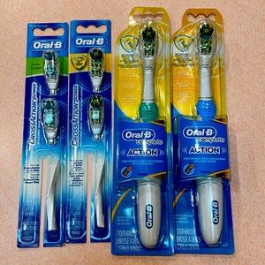 2 Oral-B Complete Action Power Toothbrushes And 4 Replacement Heads Bund…